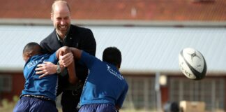 Prince William launches South Africa trip playing touch rugby with kids — and 'The Beast'