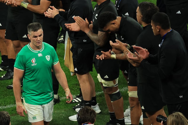 New Zealand's players applaud as Ireland's outhalf Jonathan Sexton leaves the pitch. Photograph: Emmanuel Dunand/AFP via Getty