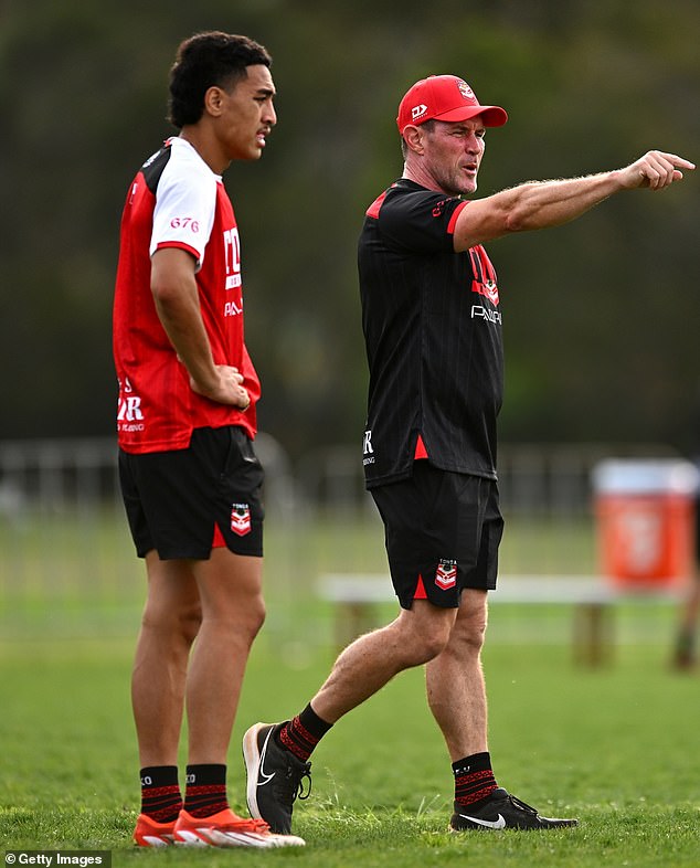 Tongan coach Kristian Woolf initially thought Taumalolo was 'tipsy' following Mad Monday drinks with the Cowboys following their 2017 NRL grand final defeat (pictured right, with Lehi Hopoate)