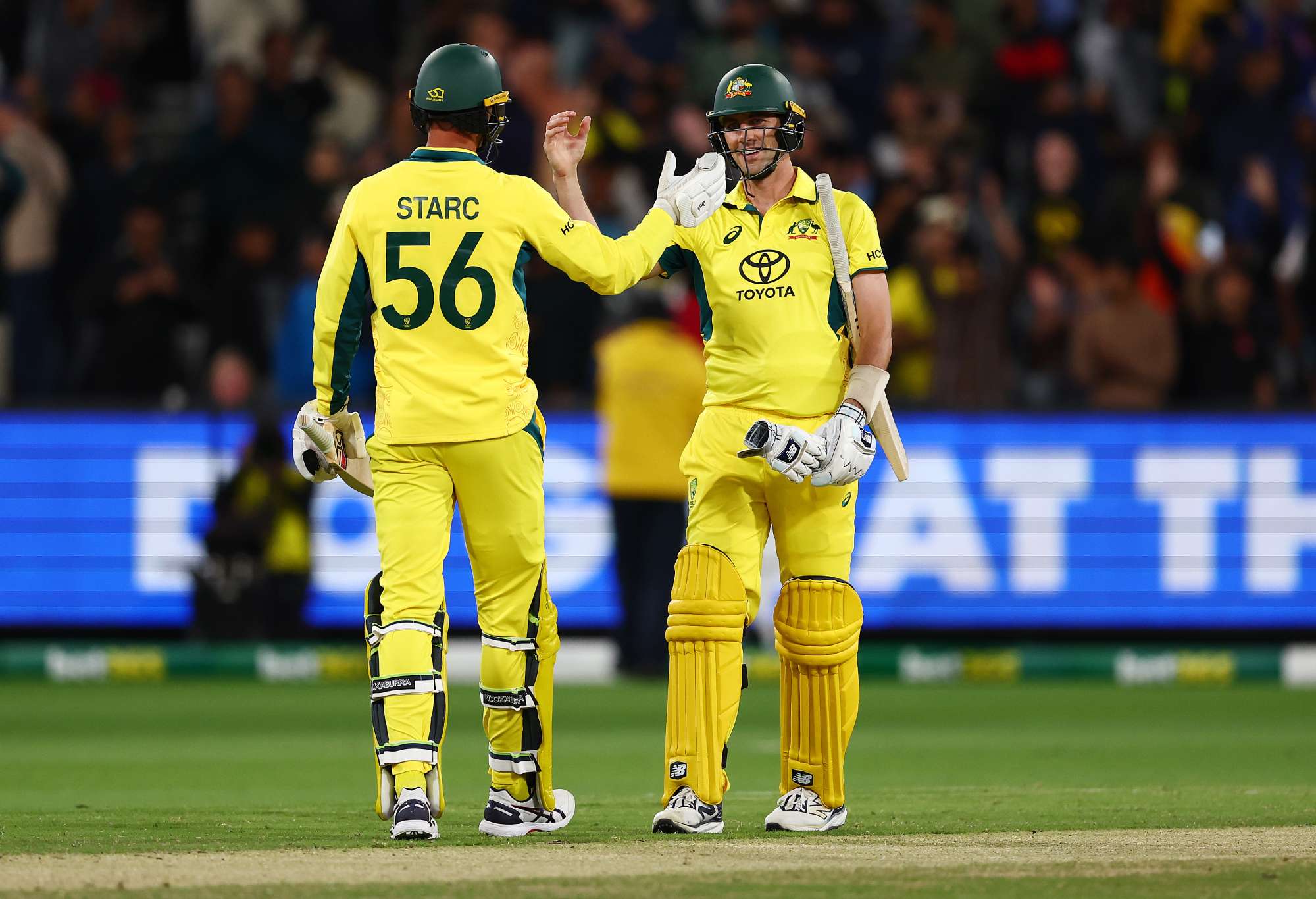 MELBOURNE, AUSTRALIA - NOVEMBER 04: Mitchell Starc and Pat Cummins of Australia celebrate victory during game one of the Men's One Day International series between Australia and Pakistan at Melbourne Cricket Ground on November 04, 2024 in Melbourne, Australia. (Photo by Morgan Hancock - CA/Cricket Australia via Getty Images)