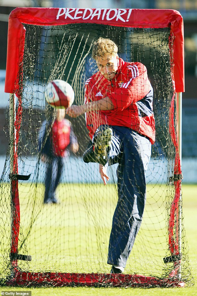 William kicks a rugby ball during his training session with the British and Irish Lions in 2005