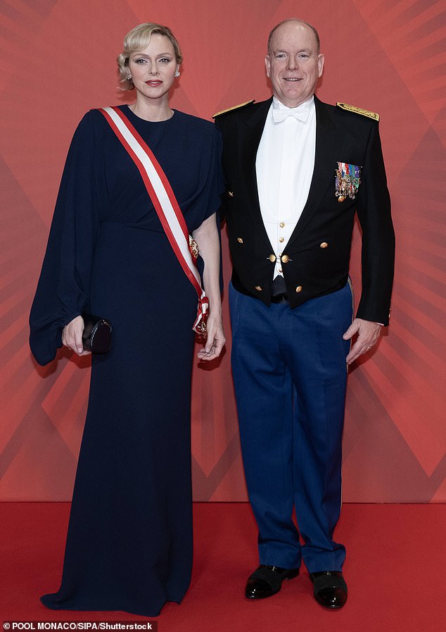 Charlene looked sensational in a long-sleeved, floor-length dress, which she accessorised with a matching blue clutch as she arrived at the Grimaldi Forum in Monte Carlo