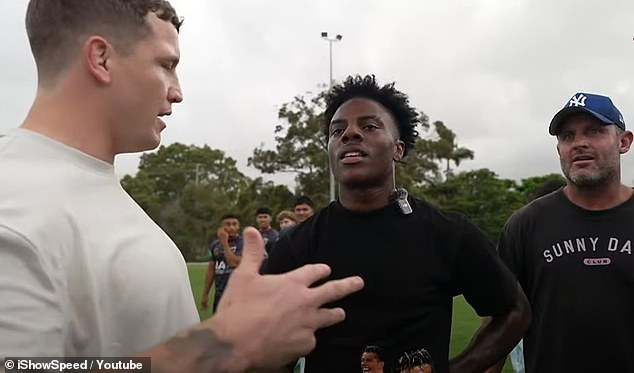 Speed gets some tips on the finer points of rugby league from Wallace and coach Chris Walker