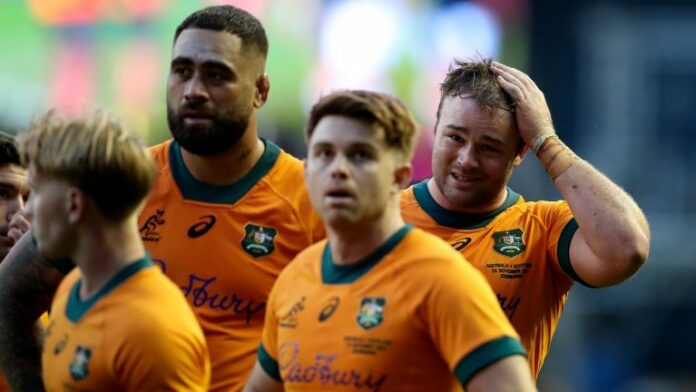 Australian players react after the Autumn Nations series rugby union match between Scotland and Australia in Edinburgh, Sunday, Nov. 24, 2024.(Scott Heppell/AP)