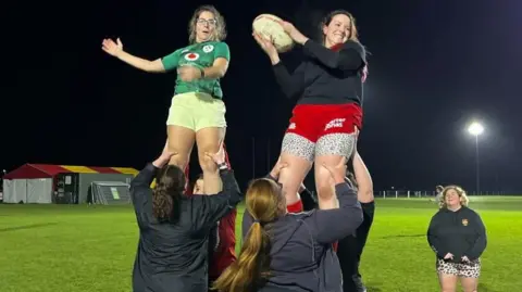 Martin Giles/BBC Woman rugby players at Cambridge Rugby Club training