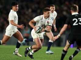 England's Henry Slade runs with the ball in the second test against New Zealand in July 2024.