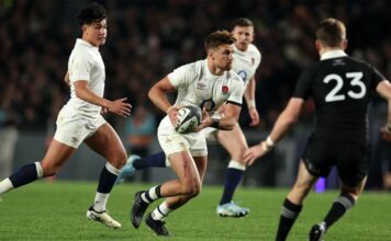England's Henry Slade runs with the ball in the second test against New Zealand in July 2024.