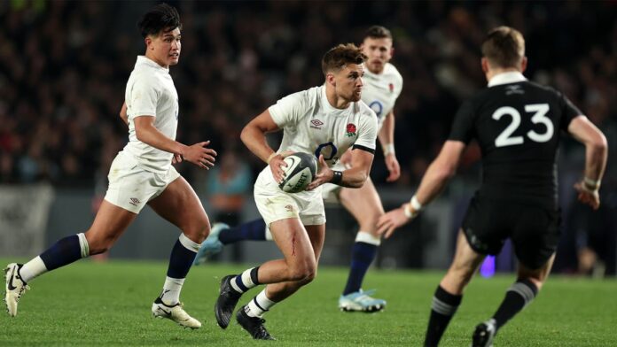 England's Henry Slade runs with the ball in the second test against New Zealand in July 2024.