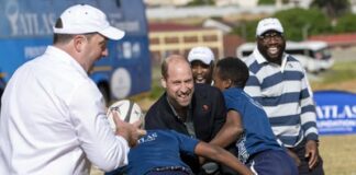 Prince William plays rugby on S.Africa climate prize