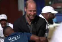 Prince William tackled by students in rugby team game during Cape Town visit