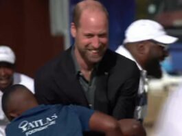 Prince William tackled by students in rugby team game during Cape Town visit