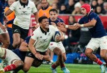 New Zealand's Caleb Clarke is tackled against France, 2024