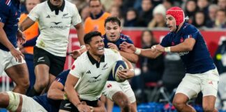 New Zealand's Caleb Clarke is tackled against France, 2024