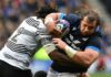 Scotland's Pierre Schoeman is tackled by Fiji's Waisea Nayacalevu during the sides' November 2022 autumn international.