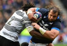 Scotland's Pierre Schoeman is tackled by Fiji's Waisea Nayacalevu during the sides' November 2022 autumn international.