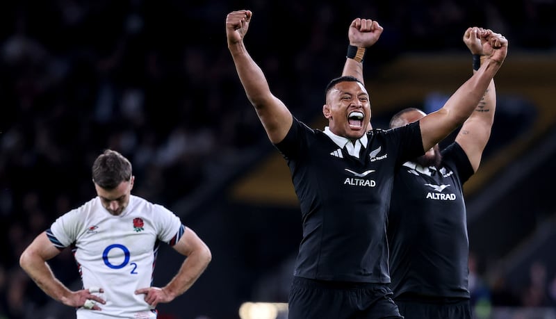 New Zealand’s Samipeni Finau and Ofa Tu’ungafasi celebrate victory after George Ford of England misse a late drop goal attempt at Twickenham. Photosport:/Inpho