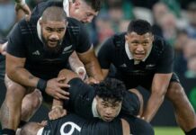 Patrick Tuipulotu #19 of New Zealand is protected by teammates in the build up to the France vs New Zealand Autumn Internationals match.