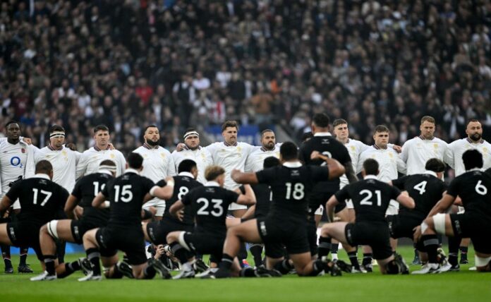 X erupts as England fans drown out haka with controversial rugby anthem