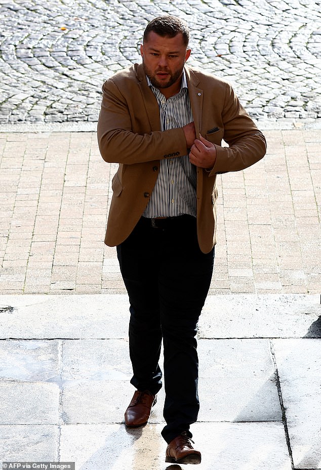 French rugby player Loick Jammes, who is accused of gang rape, arrives for his trial at the Bordeaux courthouse, in Bordeaux south-western France, on December 2, 2024