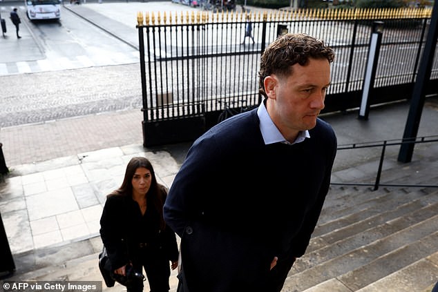 New Zealander rugby player Rory Grice (R), who is accused of gang rape, arrives for his trial at the Bordeaux courthouse, in Bordeaux south-western France, on December 2, 2024