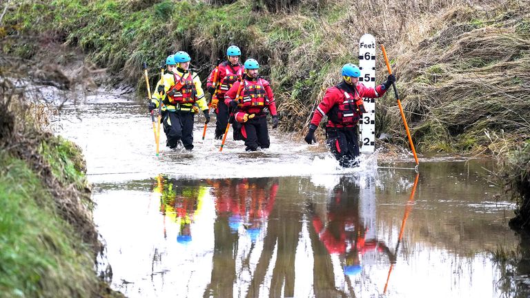 Members of a search and rescue team during a search operation at Abberwick Ford on the River Aln.
Pic: PA