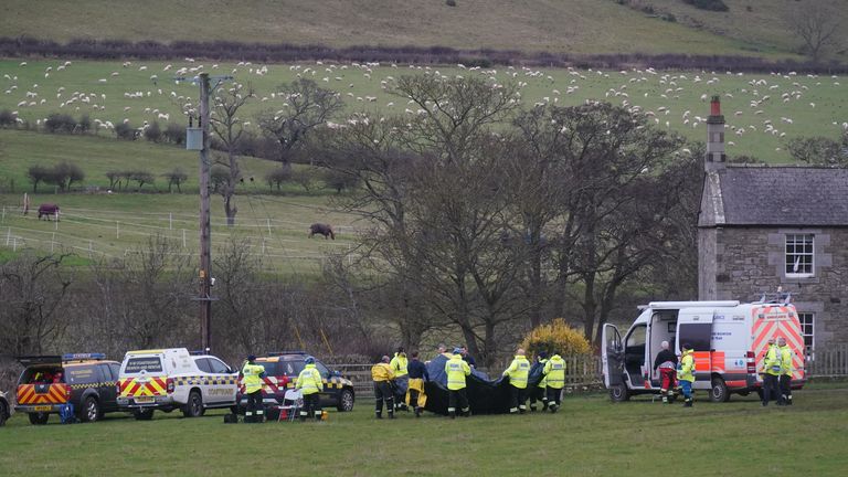 Members of a search and rescue team arrive at River Aln near Alnwick.
Pic: PA