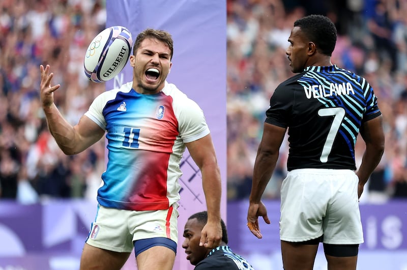 PARIS, FRANCE - JULY 27: Antoine Dupont of Team France celebrates after scoring a try during the Men’s Rugby Sevens Gold Medal match between France and Fiji on day one of the Olympic Games Paris 2024 at Stade de France on July 27, 2024 in Paris, France. (Photo by Hannah Peters/Getty Images)