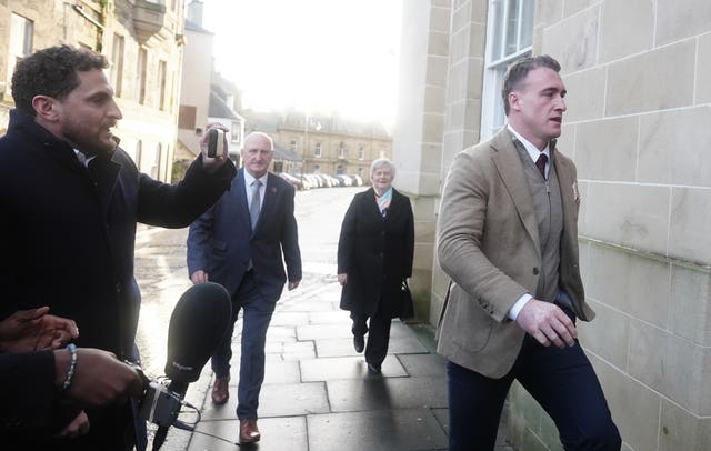 Stuart Hogg entering court building