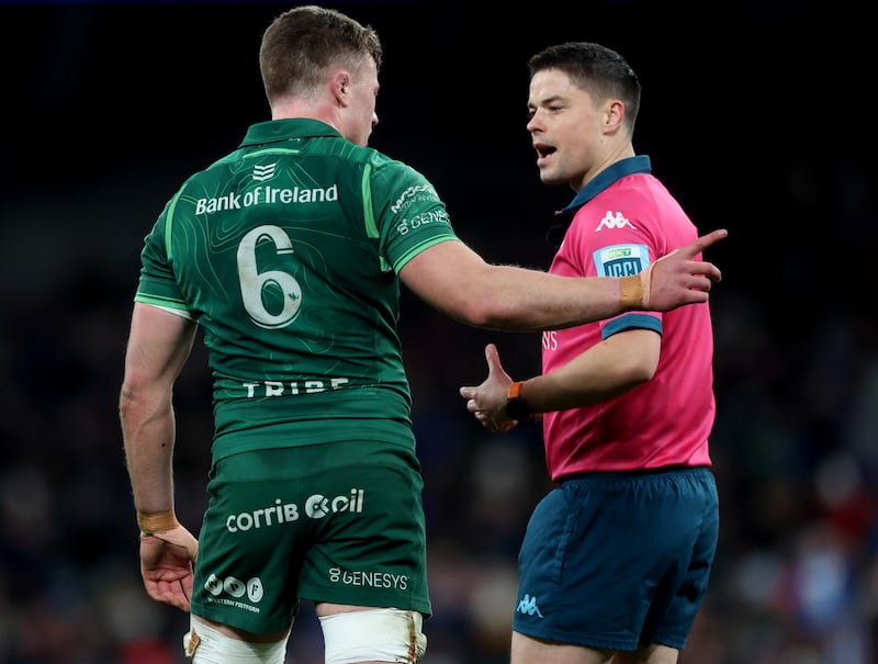 Referee Chris Busby and Connacht's Cian Prendergast at the Aviva Stadium. Photograph: James Crombie/Inpho