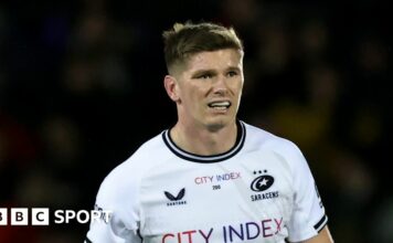 Owen Farrell holds the Premiership trophy after the 2023 final at Twickenham