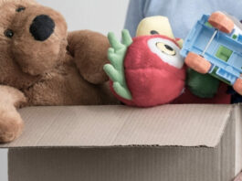 Rugby Rotarians donating Christmas toys to child victims of domestic violence