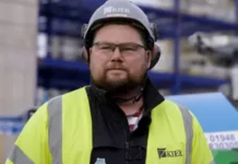 PPP Carl Walmsley at work at Sellafield is wearing a hi-vis jacket yellow jacket and hard hat.