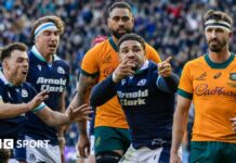 Sione Tuipulotu celebrates scoring a try for Scotland