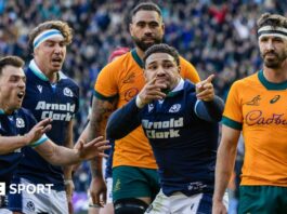 Sione Tuipulotu celebrates scoring a try for Scotland