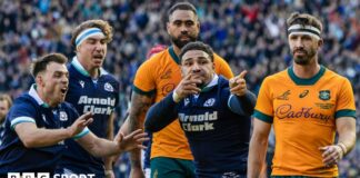 Sione Tuipulotu celebrates scoring a try for Scotland