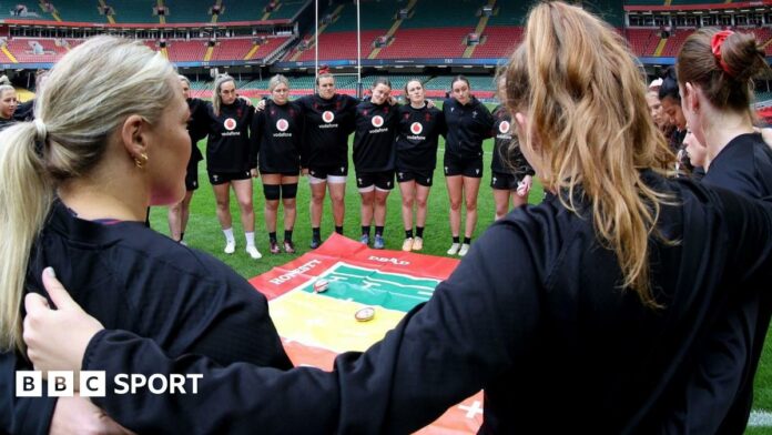 Wales women huddle at a captain's run