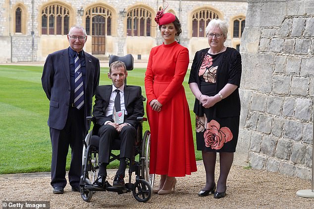 Rob Burrow (second from left) with (from left to right) father Geoff Burrow, wife Lindsey and mother Irene