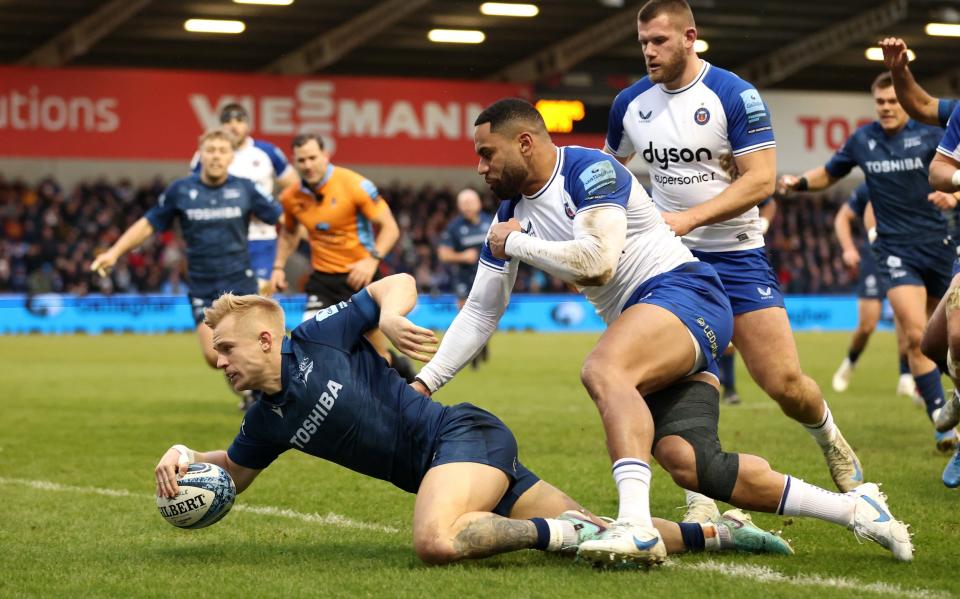 Sale winger Arron Reed goes over for the first try of the match