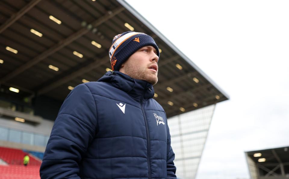 Sale scrum-half Gus Warr on the pitch before the match