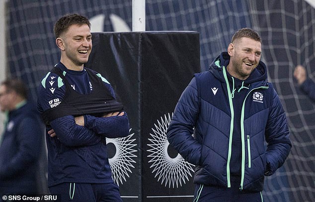 Burke's path to the No 10 shirt is blocked by Finn Russell, right, so he may start at full back