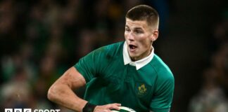 Sam Prendergast runs with the ball during Ireland's win over Australia in November