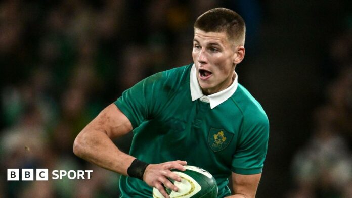 Sam Prendergast runs with the ball during Ireland's win over Australia in November