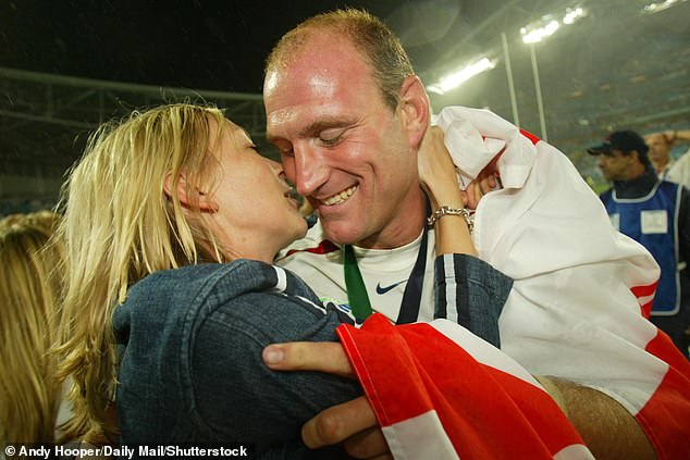 Lawrence Dallaglio is embraced by his then girlfriend Alice Corbett (now Alice Dallaglio) after winning the rugby World Cup Final in 2003