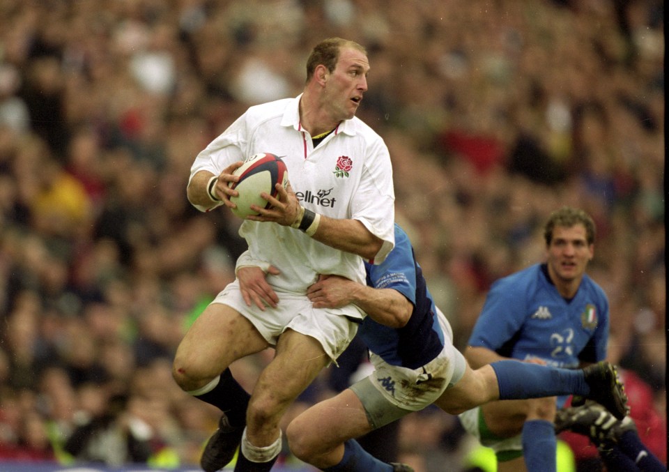 Lawrence Dallaglio of England running with the rugby ball during a match.