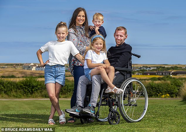 Rob Burrow pictured with his wife and three children at a holiday village in 2021