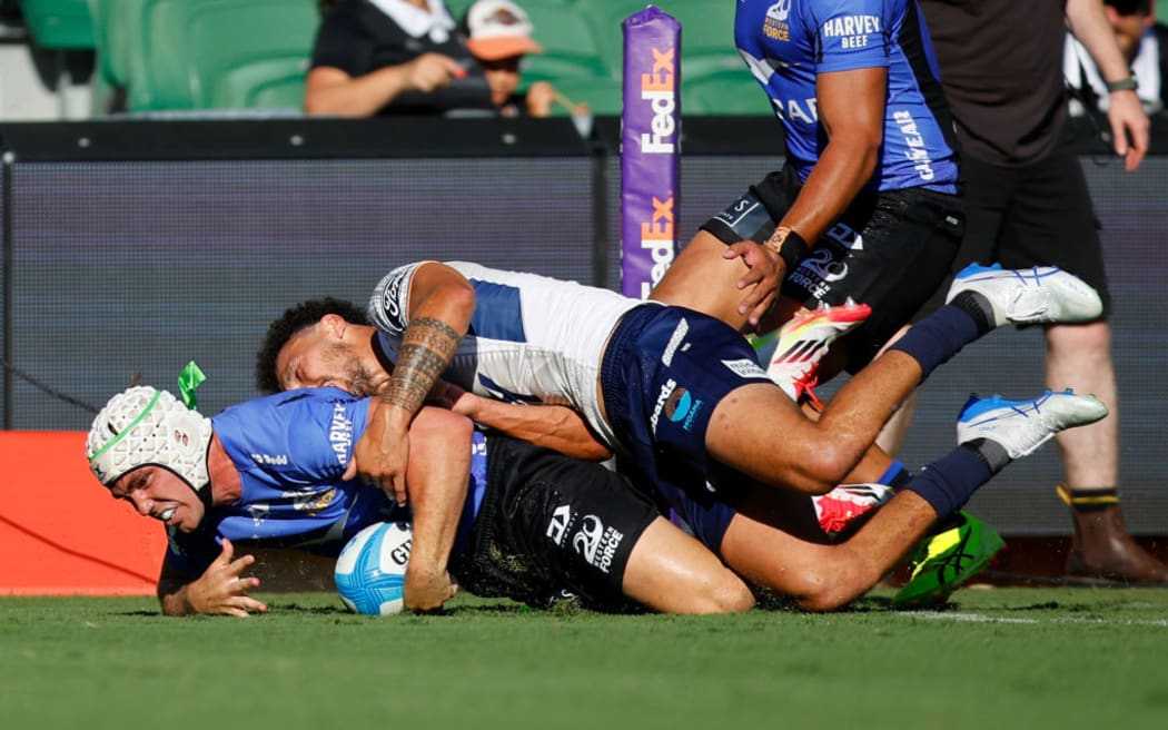 Mac Grealy scores a try during the round one Super Rugby Pacific match between Western Force and Moana Pasifika.