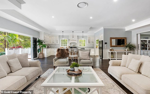 Designed for maximum comfort, the main home hosts oversized living spaces, grand views and luxury fixtures throughout. Pictured: One of several living spaces on the property