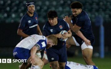 Kepu Tuipulotu runs into a tackle during an England U20 match