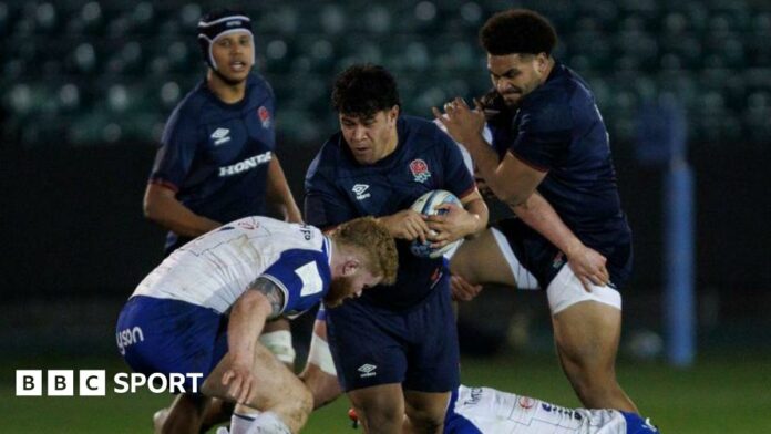 Kepu Tuipulotu runs into a tackle during an England U20 match