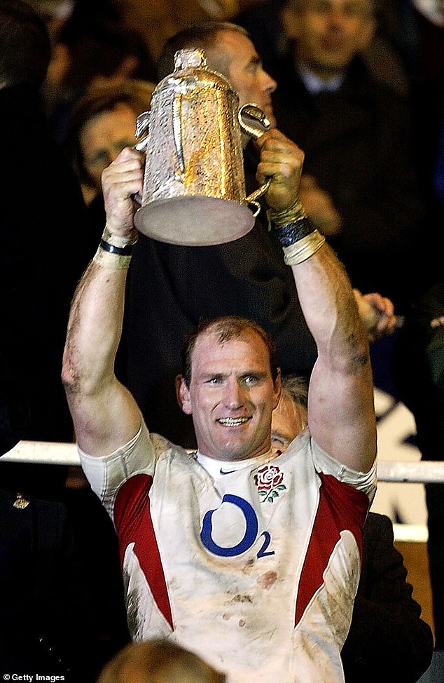 Lawrence Dallaglio, the England captain raises the Calcutta Cup after winning the RBS Six Nations in 2004